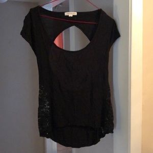 Black top with open back and lace side panels